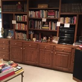 Bookcase full of books and media
