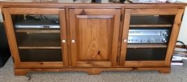 TV stand with cabinets for stereo, gaming consoles etc.
