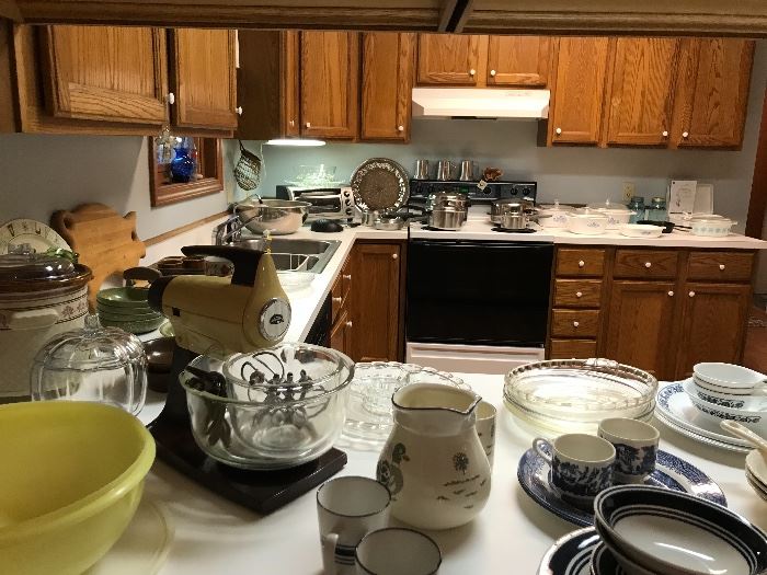 Kitchen getting set up, pots pans, Pyrex, sunbeam mixer....