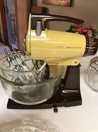 Kitchen getting set up, pots pans, Pyrex, sunbeam mixer....