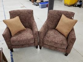 matched set of upholstered barrel-style chairs
