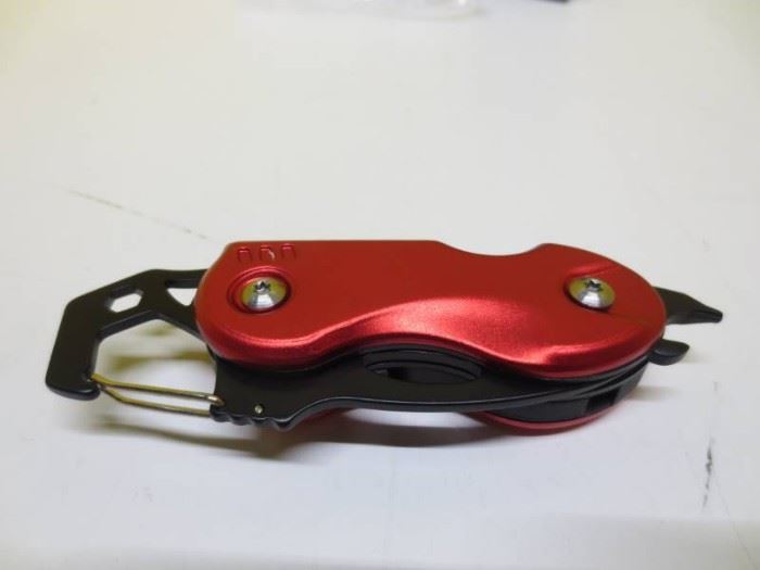 New in box Knife with LED and tool...