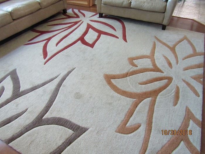 10 FT  SQUARE DALYN RUG CO.  ABSTRACT DESIGN CREAM BASE WITH 3 COLOR OF DESIGN..