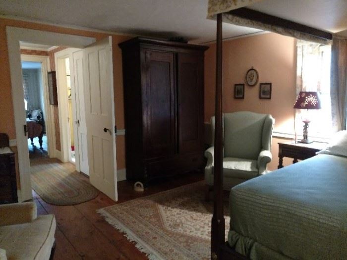 Late 1800's Armoire with top finial partially hidden. From a Brooklyn Heights carriage house.