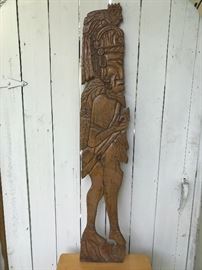 Tall wood carving from South America