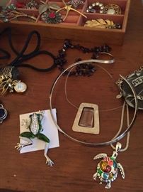 Pins and necklaces.