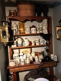  A plate rack full of containers in a Tuscan kitchen 