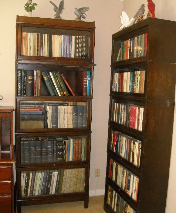 Many nice vintage stacking bookcases throughout the home. Including: Hale of Herkimer NY,  Globe Wernicke, Fred Macy