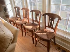 four carved side chairs