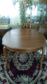 oval dining room table & rug