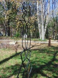 HEAVY METAL ART .  VERY STABLE.  GREAT YARD ART OR USE AS A TRELLIS.