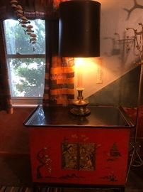 1960s Asian Modern Black & Asian Red Lacquered Cabinet Oriental Relief Bi-Fold Doors Rolled Edge Gold Accent Brass Caps. TV has been removed.
It was given as a Christmas gift from  Senator Barry Goldwater. Who ran for president in 1964.
