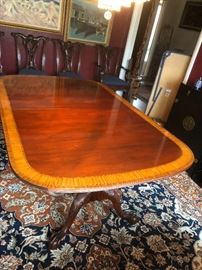 Dining room table with two extra leaves and claw feet