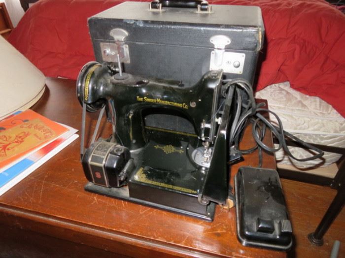 Feather weight sewing machine and case...great shape