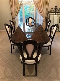 Contemporary Lacquered Dining Set.  Table with extra insert leaf two arm chairs four side chairs and light up china cabinet  