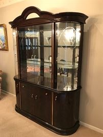 Contemporary Lacquered Dining Set.  Table with extra insert leaf two arm chairs four side chairs and light up china cabinet  