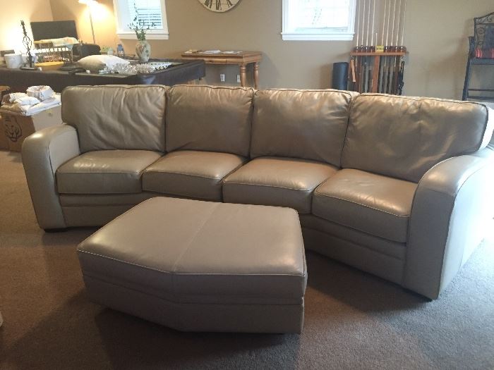 Off-white leather sectional with ottoman SOLD