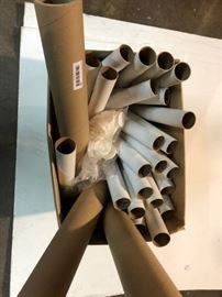 Box full of mailing tubes