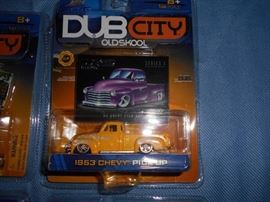 Four Dub City Metal Cars in Pkgs.