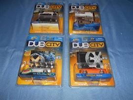 Four Dub City Metal Cars in Pkgs