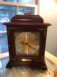 brass and wood table clock