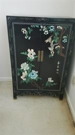 Asian inspired accent cabinet