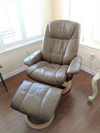 Light tan leather stress-less chair with ottoman