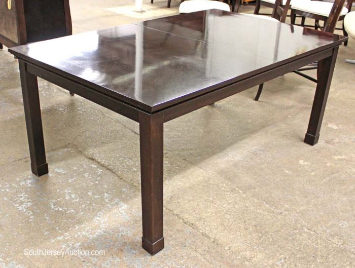 Contemporary 9 Piece Dining Room Set
Table with 2 Skirted Leaves and 8 Chairs in the Espresso Mahogany Finish
by "Lexington" made in the USA
Located Inside – Auction Estimate $300-$600