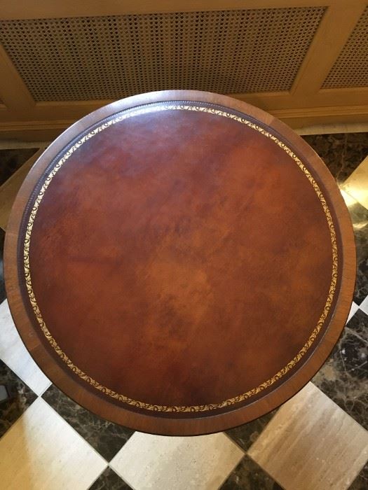 Leather top round table with excellent gold leaf embossed/tooled surround