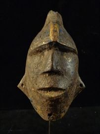 Hand carved African passport mask