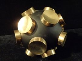 Brass studded ball sculpture by Dwell