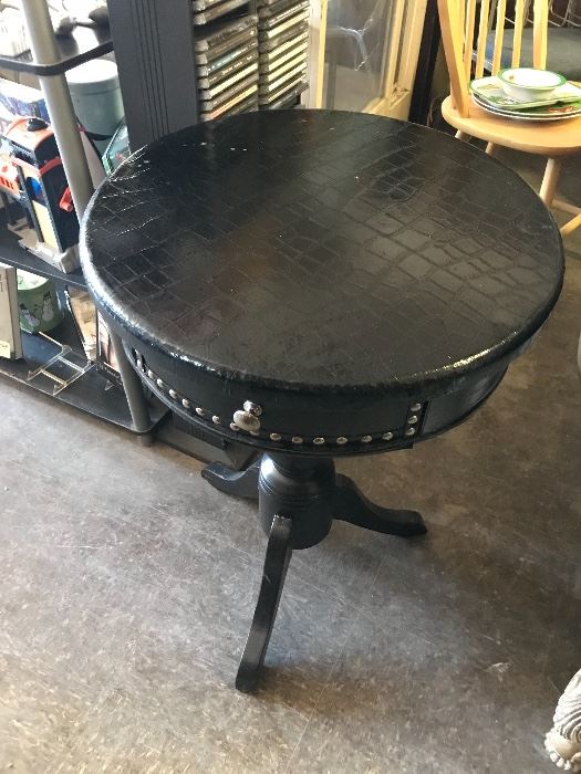 Round drum table with faux alligator finish
