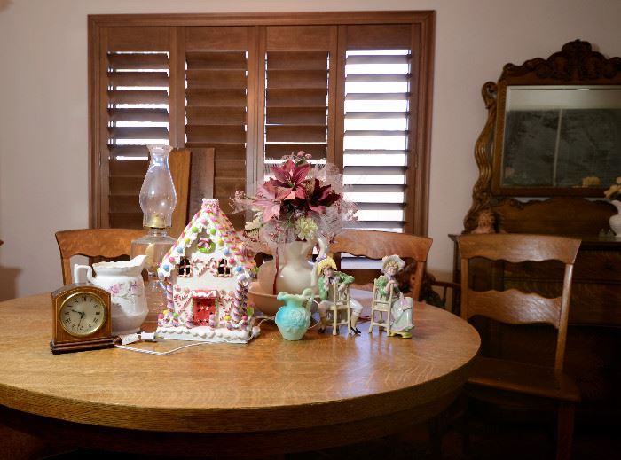 Christmas Gingerbread House that lights up and Antique clock and ceramics for sale.