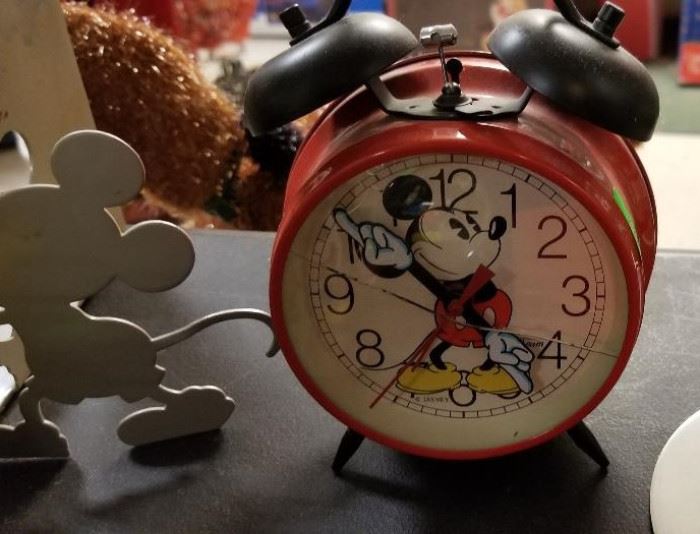 These are all like new. They have all been packed away and stored safely. A Mickey Mouse alarm clock.