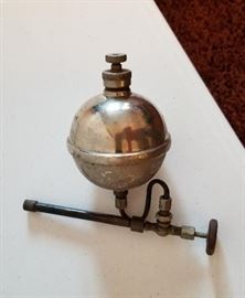 What the Heck is this? Do you know? Can you guess? We always have "What the Heck is this"  in our estate sales. This came from all the antique tools that belonged to the owner's grandfather. One suggestion was that it was an antique robot's eyeball! Yes that guess was coming from a much younger person!