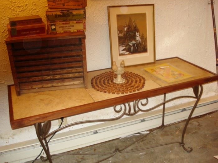 Iron and wood table, cigar  boxes, German print