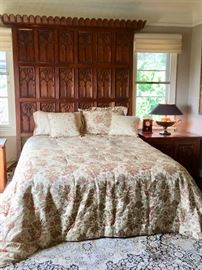 Floor-to Ceiling Hand-Carved Headboard as part of Bedroom Suite; Brass Urn Lamp with Swan-Neck Handles