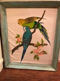 painted parrots on fabric in a vintage frame
