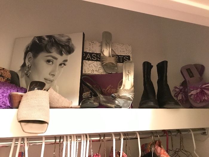 Check out Audrey Hepburn on the shoe shelf. Cute boots and dress heels for the party season