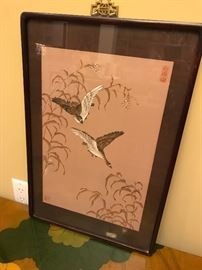 a small hand painted vintage Asian piece well framed
