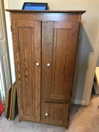 #8	(2) oak look Laminate Cabinet w/3 doors 27.5x16x 52  $35 each	 $70.00 	