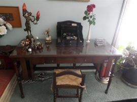 Edwardian Mahogany writing desk wide side shelves  53.5 in length  x 20.5 depth molded edge fitted with glass panel, single drawer with brass knob pulls.