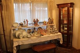 A picture of one of the smaller display cases and beautiful collectibles.
