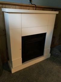 Electric fireplace-  just bring it home, plug it in, and enjoy the ambiance and warmth!