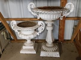 Large antique cast iron garden urns