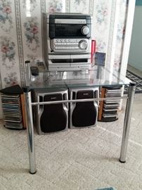 Compact stereo system on a glass top end table