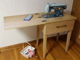 Remington sewing machine with cabinet
