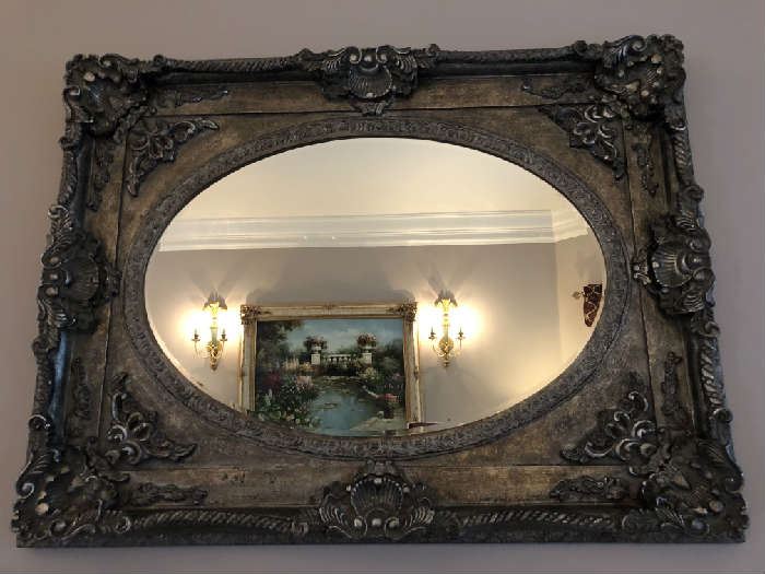 Large Oval beveled glass mirror w/shell motif                  
~ 50" x 37 1/2"