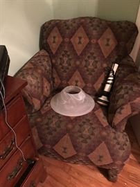 ARMCHAIR! Super comfy! (That's an electric massager there. Purely for neck muscles, I'm sure.)