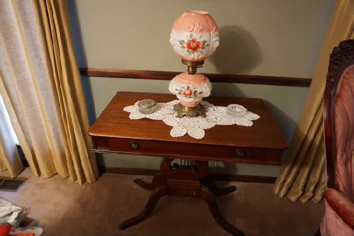 federal style antique table with hurricane lamp